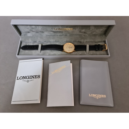 4 - A gent's gold plated Longines Presence wristwtach, with box and papers.