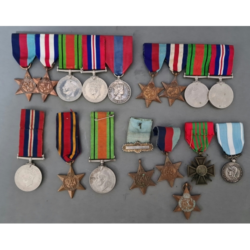 57 - A tin of mainly WWII medals