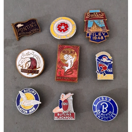 61 - A tin of various Butlin's & Pontin's pin badges.