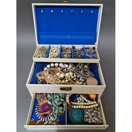 70 - A jewellery box containing vintage and modern costume jewellery including necklaces, earrings, brooc... 