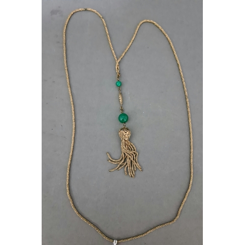 75 - A vintage gilt metal and green bead necklace, drop length 13cm, chain length 82cm.