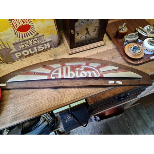 119 - A cast metal 'Albion' automobilia sign.