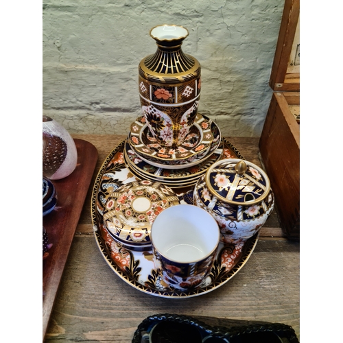 124 - Assorted Royal Crown Derby and Derby Imari pattern china including a vase, a jam pot, lidded dishes,... 