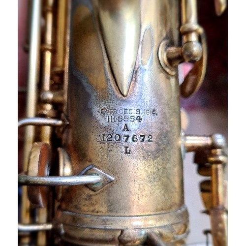 231 - An alto saxophone, made by C G Conn Ltd, Elkhart Ind, USA, 'Patd Dec 8, 1914, A M207672 L', in case.