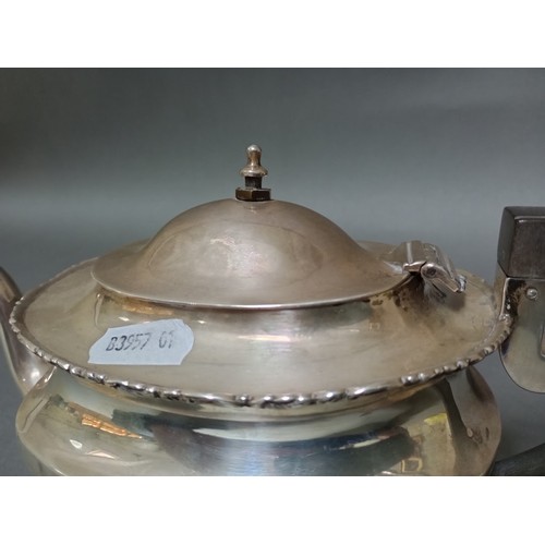 199 - A three piece hallmarked silver tea set, gross wt. 21ozt. 
Condition- the hinge to the lid has detac... 