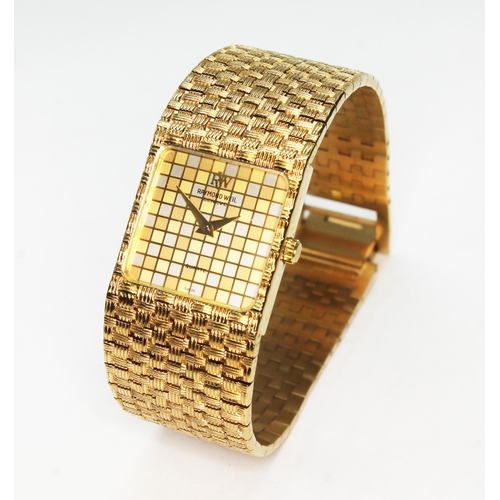 83 - A gold plated Raymond Wiel wristwatch with checker board dial and gold plated basket weave strap.