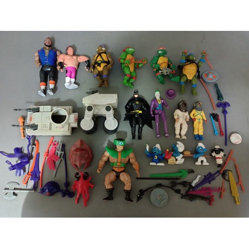 207 - A box of vintage toys to include He Man, Thundercats, Teenage Mutant Ninja Turtles etc.