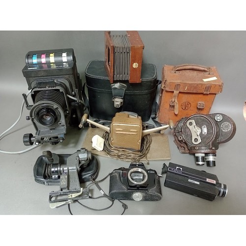 171 - Two boxes of cameras and camera equipment including Bell & Howell Filmo 70 cine camera, Polaroid, Pr... 