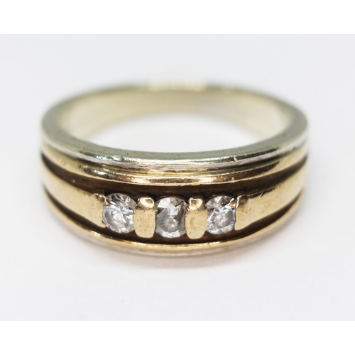 279 - A hallmarked 9ct gold three stone diamond ring, gross wt. 9.6g, size U.