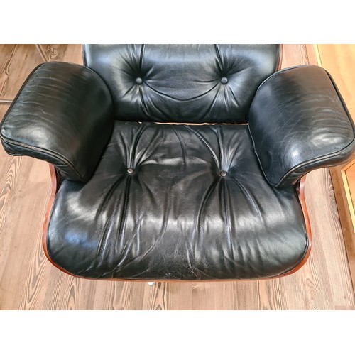 2 - A black leather 670 lounge chair after Charles & Ray Eames.