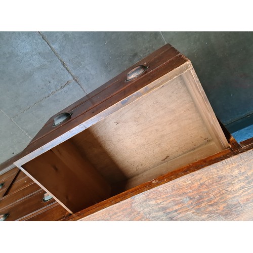 23 - A large early 20th century oak shop counter, originally from a millinery shop in Crosby, height 90.5... 