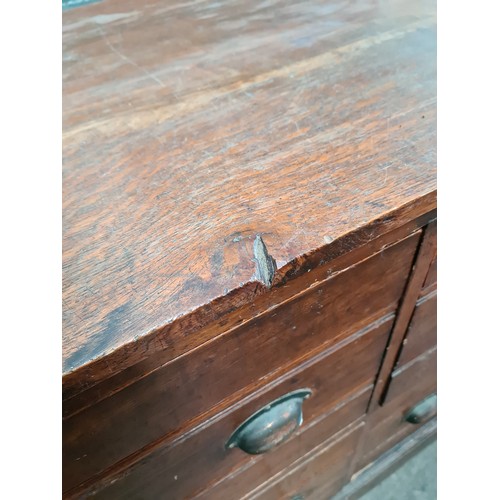 23 - A large early 20th century oak shop counter, originally from a millinery shop in Crosby, height 90.5... 