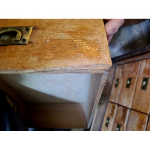 15 - An early 20th century oak tambour fronted filing cabinet/ chest of drawers, height 115.5cm.