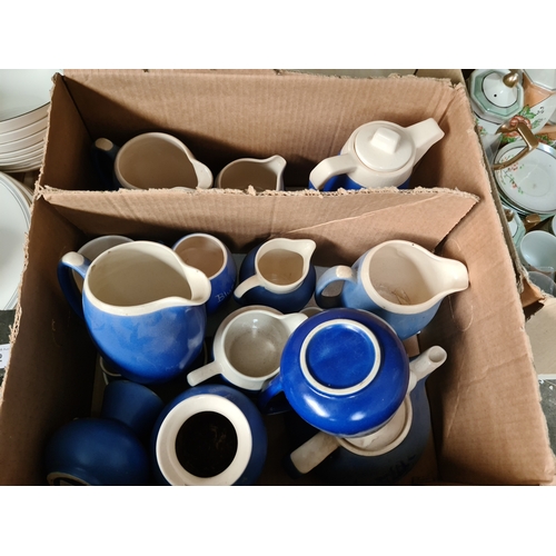 653 - A collection of blue and white Cornish ware.