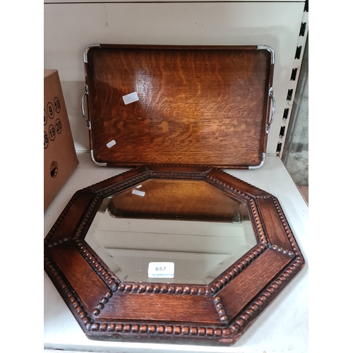 657 - Octagonal oak framed mirror and an oak tray with mounrs