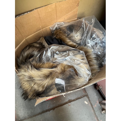 482 - A box of faux fur wraps by Top Shop