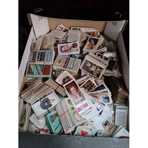 65 - A box of cigarette cards