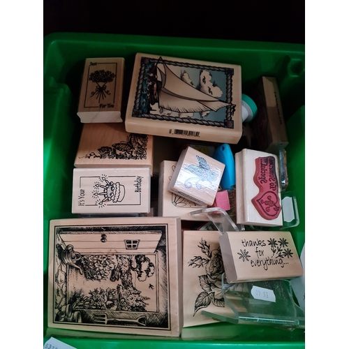 67 - A box of wooden craft printing blocks.