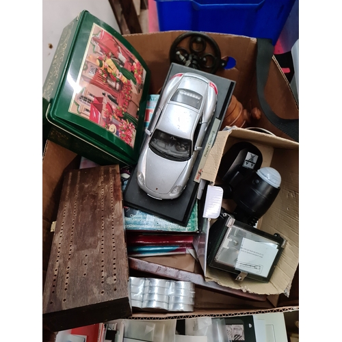 81 - A box of misc including books, PIR light, tea lights, Dominoes and cribbage board, haberdashery swat... 