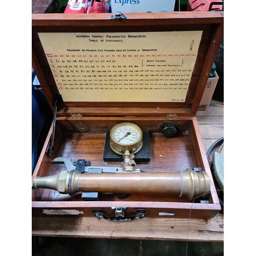 102 - A wooden boxed Piezometer Branchpipe