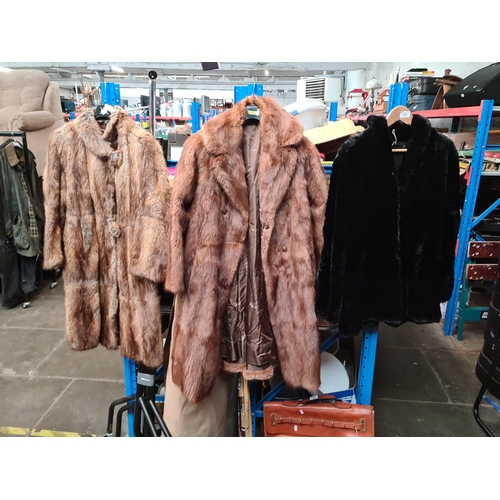 130 - 2 vintage fur coats and a jacket.