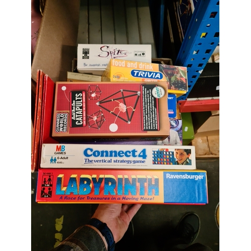 154 - A box of board games including Connect 4, Triominoes etc