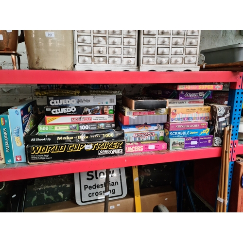 244 - A collection of various board games including Monopoly, Scrabble, jigsaws etc. & a bundle of snooker... 