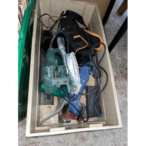 473 - A box of electrical items including Bosch sander, etc.