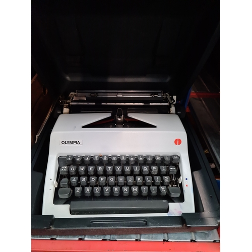 363 - A vintage Olympia typewriter.