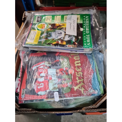 366 - A box of football and rugby programmes including non league football