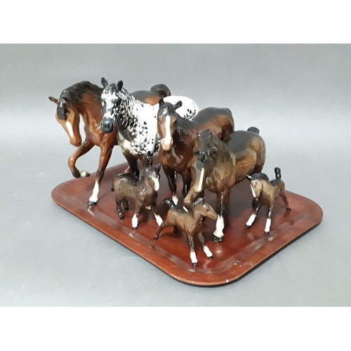 149 - Seven assorted Beswick and Royal Doulton horses.