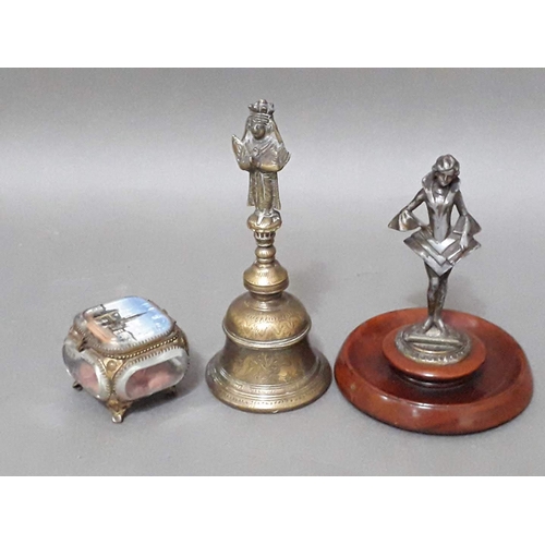 166 - A mixed lot comprising an Indian brass temple bell, an Art Deco style match striker and a souvenir g... 