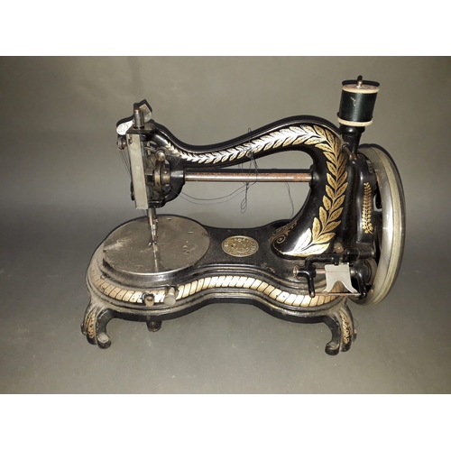 176 - A Jones Hand Machine sewing machine.