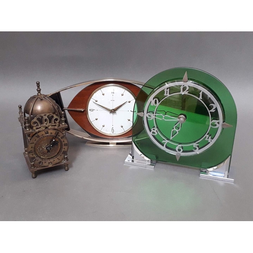 192 - Three clocks comprising a retro Metamic, a Smiths lantern style clock and an Art Deco green glass an... 