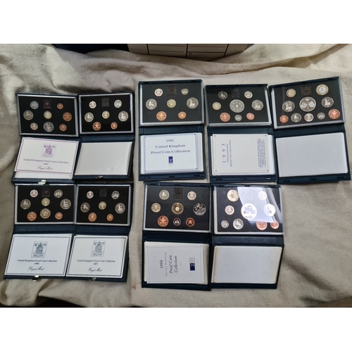 141 - A collection of 9 UK Proof Coin Sets comprising of 1983(with cert), 1985,1986(with cert),1987(with c... 