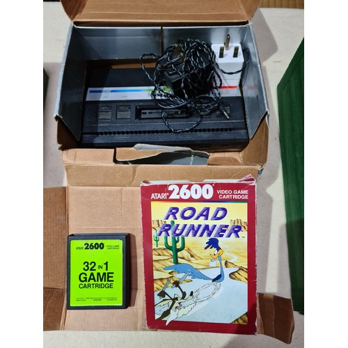 262 - Two Atari 2600 games consoles with assorted games, various Megdrive games and a PS1 with two control... 