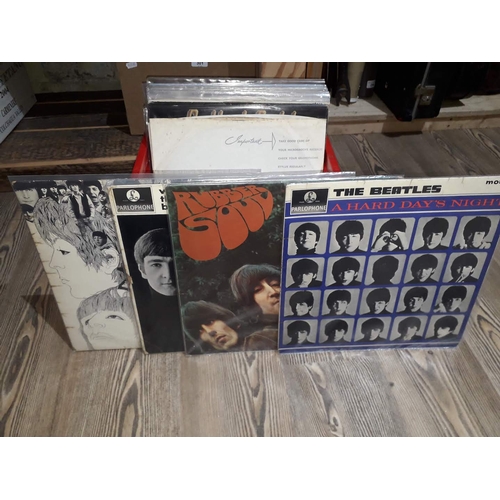 302 - A box of LPs to include Beatles, Rolling Stones, etc.