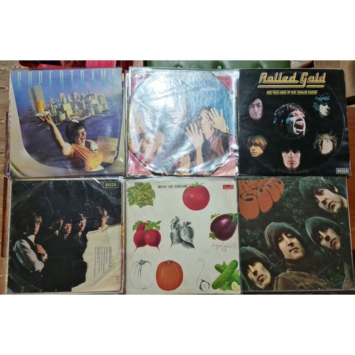 302 - A box of LPs to include Beatles, Rolling Stones, etc.