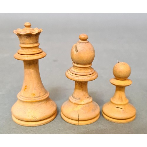 107 - A boxwood chess set, king height 8.5cm.