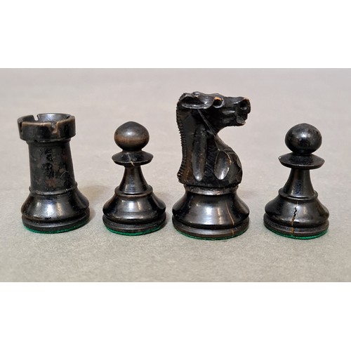 108 - An early 20th century weighted chess set, king height 7.5cm.