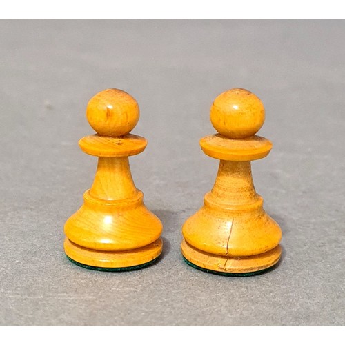 108 - An early 20th century weighted chess set, king height 7.5cm.