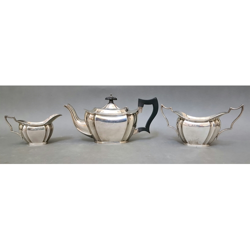 23 - A trio of hallmarked silver tea set comprising of a teapot, twin handled sugar bowl and milk jug, J ... 