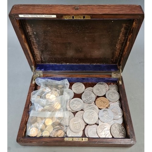 7 - A wooden box containing commemorative crowns etc. and 2 bags of Borough of Darlington travel tokens