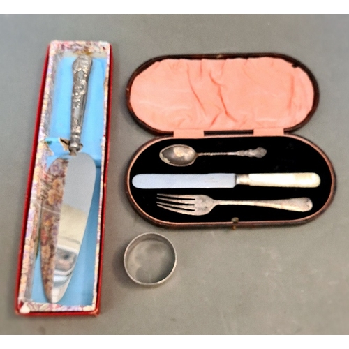 37 - A cased non-matching set of 3 to include a fork, a small teaspoon and a spread knife together with a... 