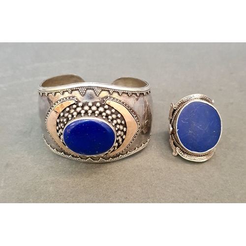 41 - A bracelet marked 925 with blue insert, together with similar ring in white metal but unmarked