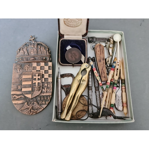 61 - A small box of bric a brac including sports medals, penknives, propelling pencil etc