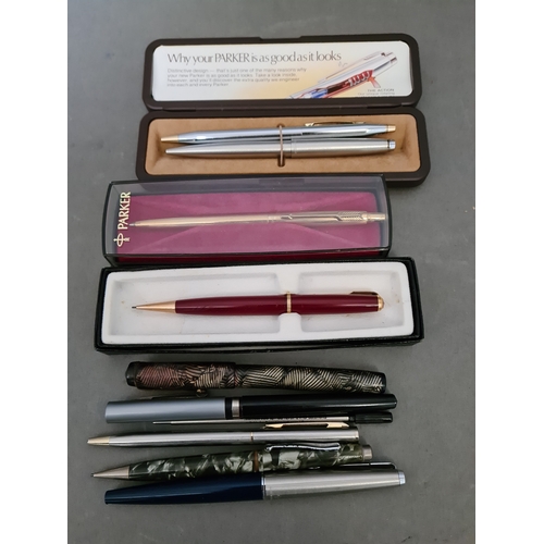 64 - A collection of pens, etc to include a Parker with 14ct gold nib, a rolled gold pen, etc.