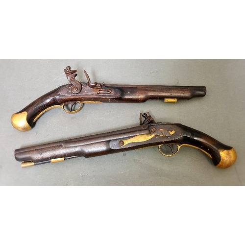 65 - A pair of flintlock pistols, the side plates stamped 'Tower' and 'GR', brass also numbered 5271 & 52... 