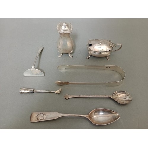 100 - A collection of hallmarked silver items including a salt cellar with cobalt blue liner, a pepper pot... 