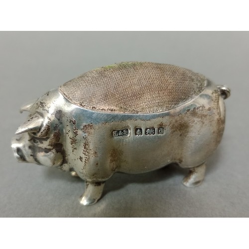 103 - A silver novelty pin cushion in the form of a pig, 5cm long, Birmingham, Levi & Salaman, 1903.